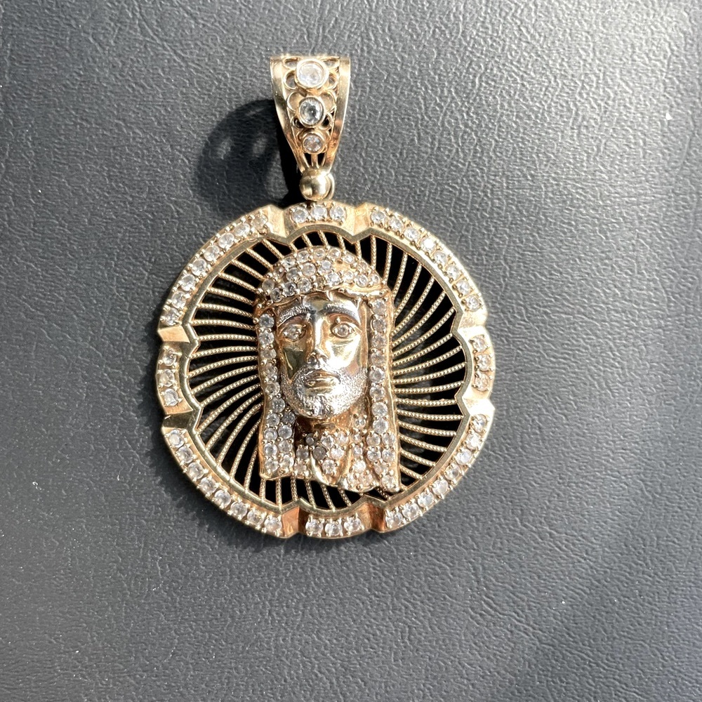 Jesus Piece 10k Gold Pendant.